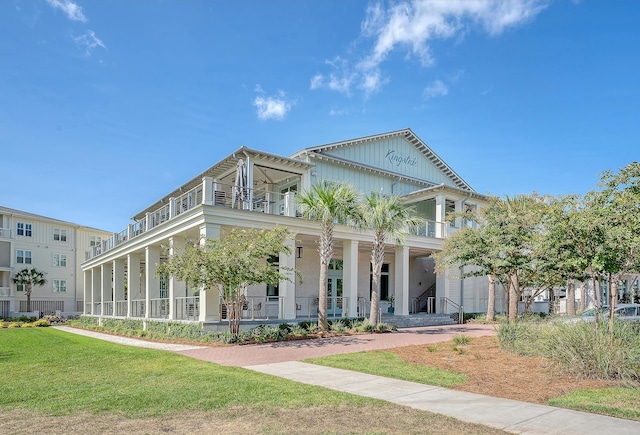 130 River Landing Dr Unit 5108, Charleston, SC 29492 - view of front of home featuring covered porch, a balcony, and a front yard