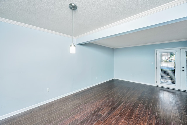 unfurnished room featuring french doors, a textured ceiling, dark hardwood / wood-style flooring, and ornamental molding