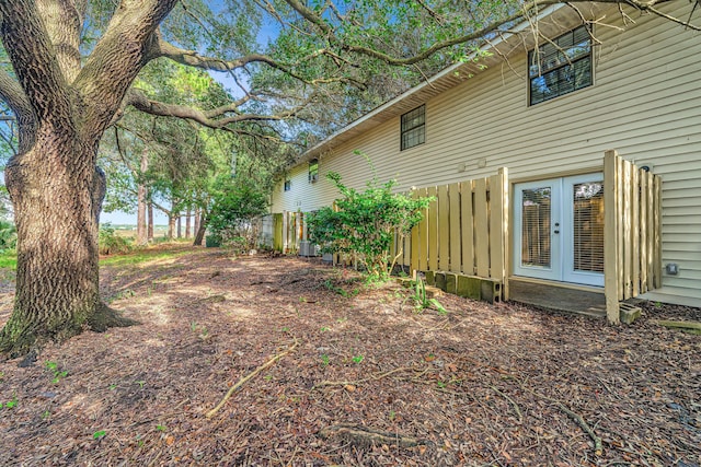 view of yard featuring french doors