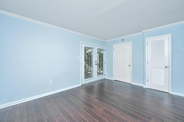 unfurnished room with dark hardwood / wood-style flooring, french doors, crown molding, and a textured ceiling