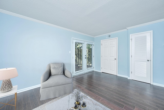 unfurnished room featuring ornamental molding, french doors, dark wood-type flooring, and a textured ceiling