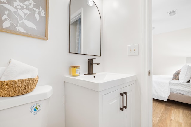 305 Forest Cir, Summerville, SC 29483 - ensuite bathroom featuring vanity, toilet, and wood finished floors