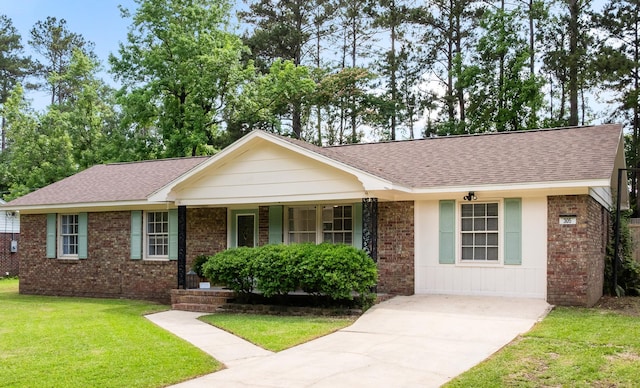 305 Forest Cir, Summerville, SC 29483 - single story home with roof with shingles, a front lawn, brick siding, a porch, and concrete driveway