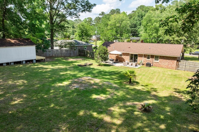 305 Forest Cir, Summerville, SC 29483 - view of yard featuring a patio area, a fire pit, and central AC unit