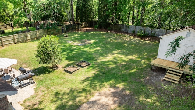 305 Forest Cir, Summerville, SC 29483 - view of yard featuring an outbuilding and a wooden deck