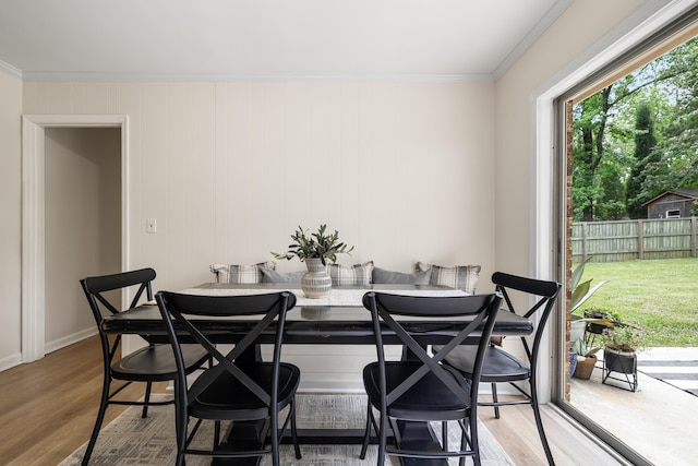 305 Forest Cir, Summerville, SC 29483 - dining space with ornamental molding, wood finished floors, and baseboards