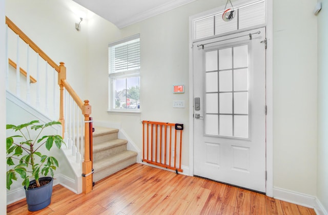 520 Crossland Dr, Moncks Corner, SC 29461 - entrance foyer featuring stairs, wood finished floors, baseboards, and ornamental molding