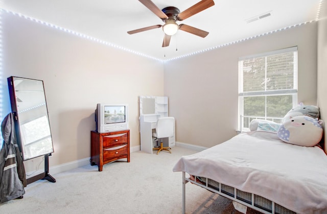 520 Crossland Dr, Moncks Corner, SC 29461 - bedroom with multiple windows, carpet, baseboards, and a ceiling fan