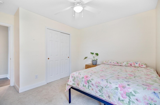 520 Crossland Dr, Moncks Corner, SC 29461 - bedroom with carpet, a closet, baseboards, and ceiling fan