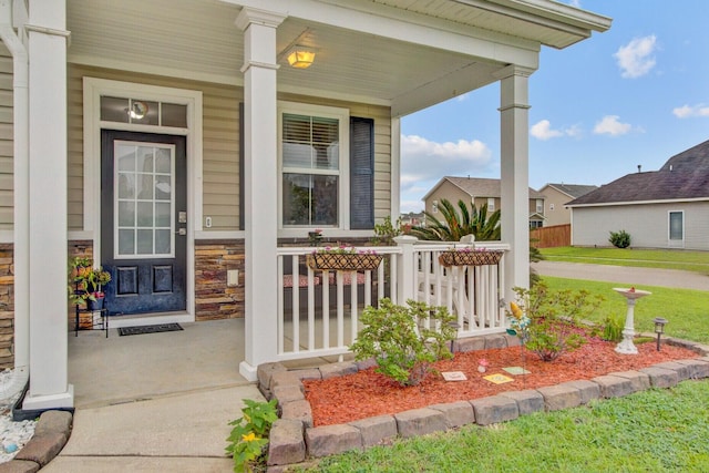 520 Crossland Dr, Moncks Corner, SC 29461 - view of exterior entry featuring a porch and stone siding