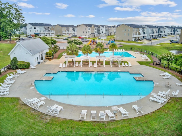 520 Crossland Dr, Moncks Corner, SC 29461 - community pool featuring a residential view, a pergola, and a patio
