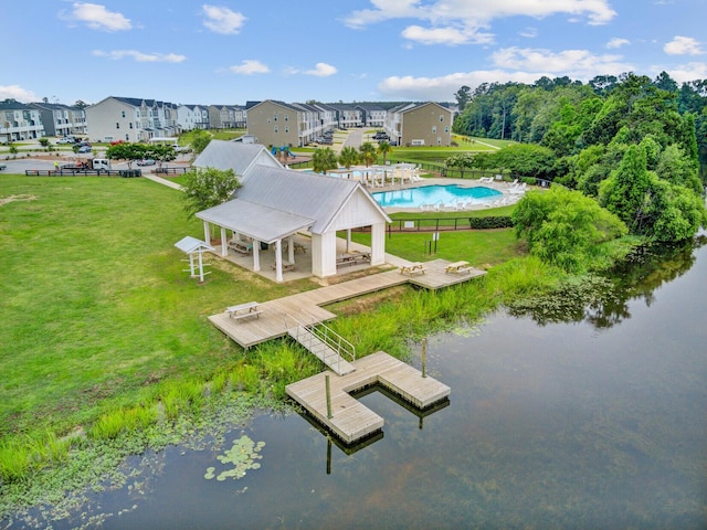 520 Crossland Dr, Moncks Corner, SC 29461 - aerial perspective of suburban area featuring a pool and a large body of water