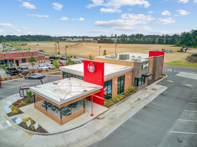 520 Crossland Dr, Moncks Corner, SC 29461 - view of building exterior with cooling unit and view of scattered trees