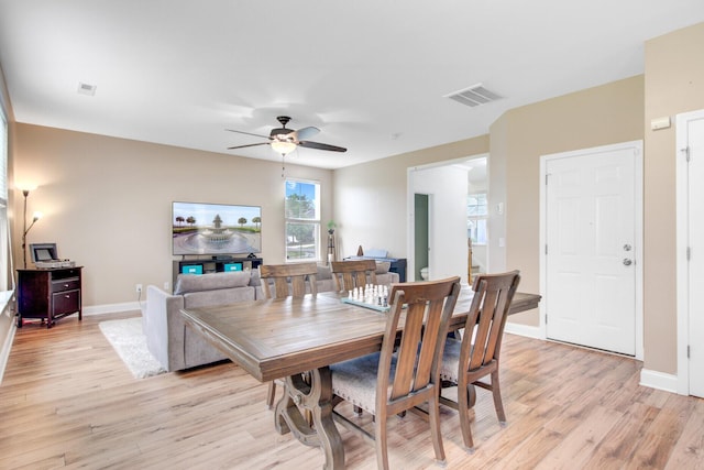 520 Crossland Dr, Moncks Corner, SC 29461 - dining room featuring light wood finished floors, baseboards, and a ceiling fan