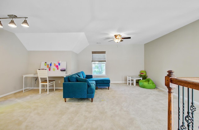 sitting room with baseboards, carpet, and a ceiling fan