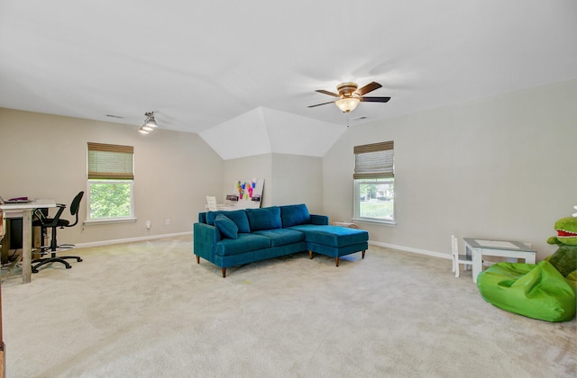 living room featuring baseboards, carpet, a ceiling fan, and visible vents