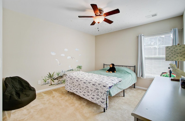 bedroom featuring baseboards, multiple windows, and carpet