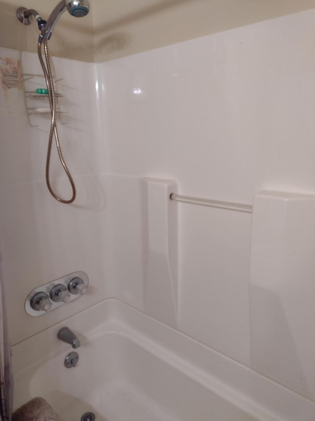 full bath featuring bathing tub / shower combination