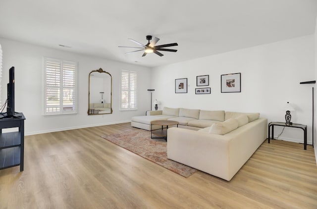 117 Red Leaf Blvd, Moncks Corner, SC 29461 - living room with a ceiling fan, light wood-type flooring, and baseboards