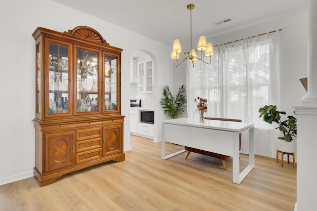 117 Red Leaf Blvd, Moncks Corner, SC 29461 - dining area featuring light wood-style floors, a chandelier, and baseboards