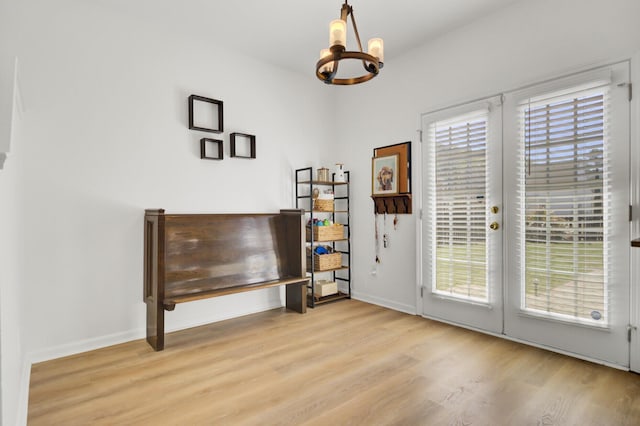 117 Red Leaf Blvd, Moncks Corner, SC 29461 - doorway with a chandelier, light wood-style flooring, french doors, and baseboards
