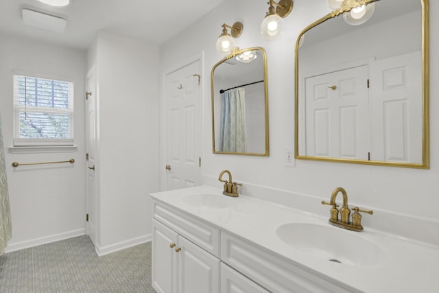 117 Red Leaf Blvd, Moncks Corner, SC 29461 - bathroom with double vanity, baseboards, and a shower with curtain