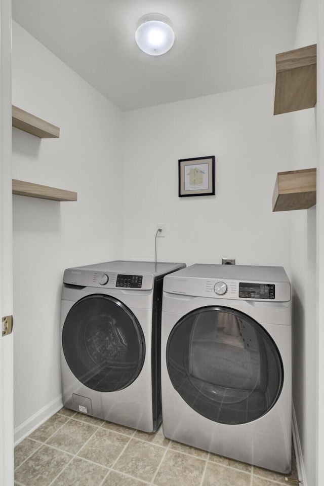 117 Red Leaf Blvd, Moncks Corner, SC 29461 - clothes washing area with washing machine and clothes dryer and baseboards