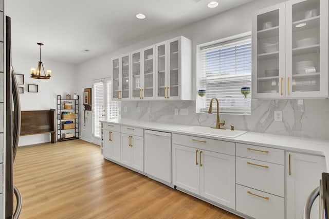 117 Red Leaf Blvd, Moncks Corner, SC 29461 - kitchen featuring white dishwasher, a sink, plenty of natural light, light wood finished floors, and recessed lighting