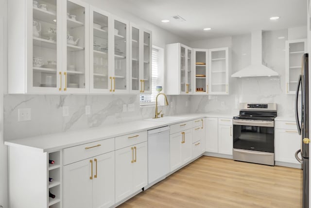 117 Red Leaf Blvd, Moncks Corner, SC 29461 - kitchen with electric range, wall chimney range hood, dishwasher, a sink, and white cabinetry