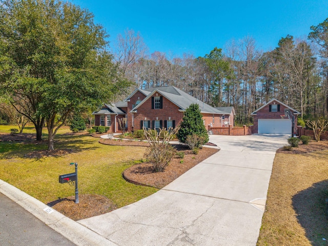 view of front of home with a front lawn and brick siding