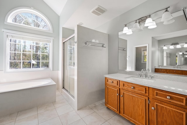 full bath with a stall shower, a garden tub, visible vents, and tile patterned floors