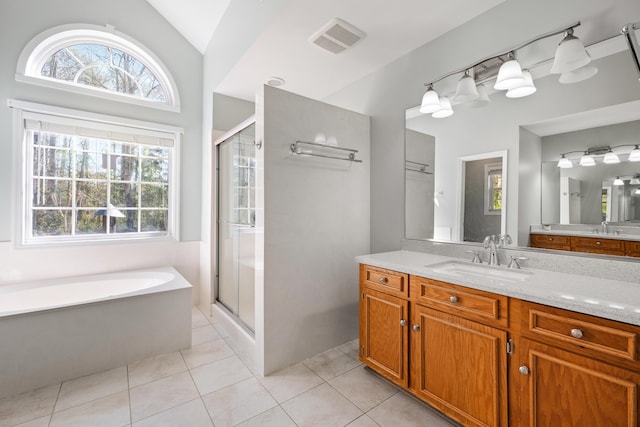 bathroom featuring a garden tub, tile patterned flooring, visible vents, and a shower stall