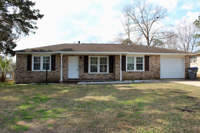 ranch-style house with a garage and a front yard