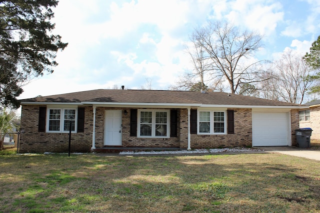 ranch-style home with a garage and a front yard