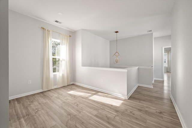 5748 Pilgrim Ave Unit D, Hanahan, SC 29410 - unfurnished room with light wood finished floors and baseboards