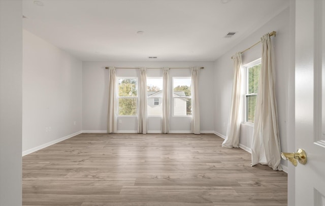 5748 Pilgrim Ave Unit D, Hanahan, SC 29410 - unfurnished room with light wood-style flooring and baseboards