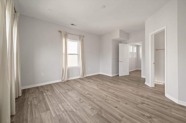 5748 Pilgrim Ave Unit D, Hanahan, SC 29410 - unfurnished bedroom featuring light wood-style floors and baseboards