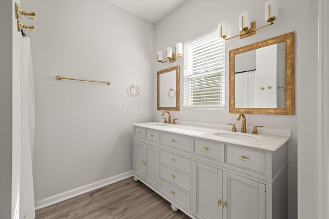 5748 Pilgrim Ave Unit D, Hanahan, SC 29410 - full bath featuring double vanity, wood finished floors, and baseboards
