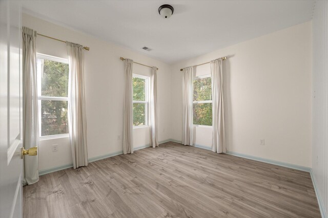 5748 Pilgrim Ave Unit D, Hanahan, SC 29410 - spare room with light wood finished floors and baseboards