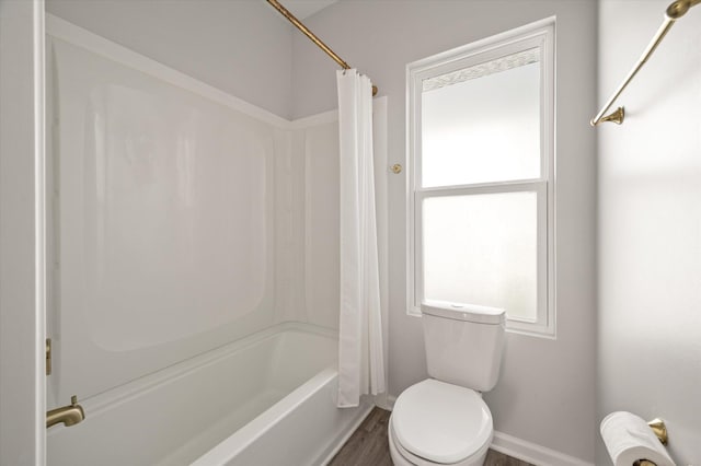 5748 Pilgrim Ave Unit D, Hanahan, SC 29410 - full bath featuring healthy amount of natural light, shower / tub combo, toilet, and baseboards
