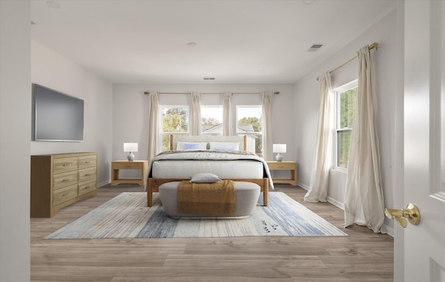 5748 Pilgrim Ave Unit D, Hanahan, SC 29410 - bedroom featuring light wood-style floors and baseboards
