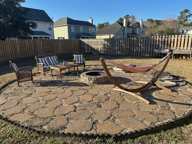 view of patio / terrace featuring a fire pit