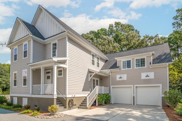 view of front facade featuring covered porch and a garage