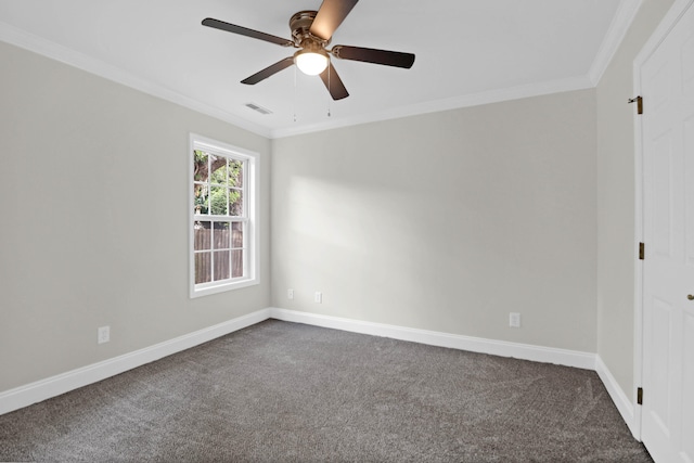 carpeted spare room featuring crown molding and ceiling fan