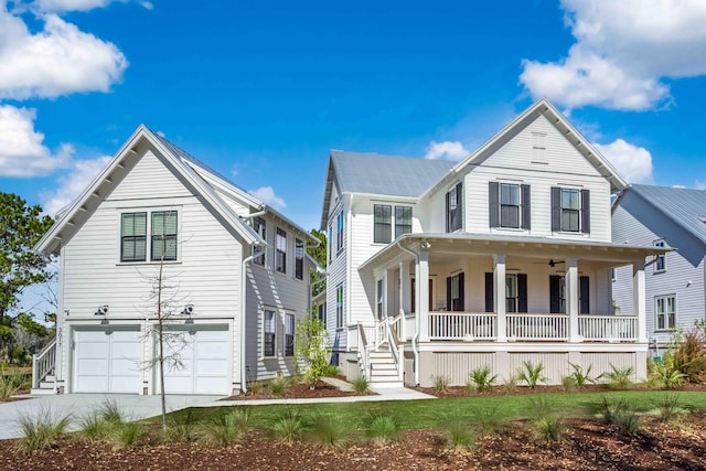 view of front of house with a porch, an attached garage, and driveway