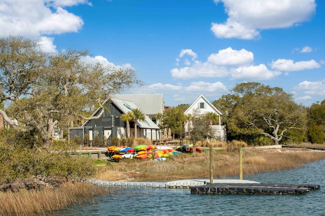 exterior space with a water view