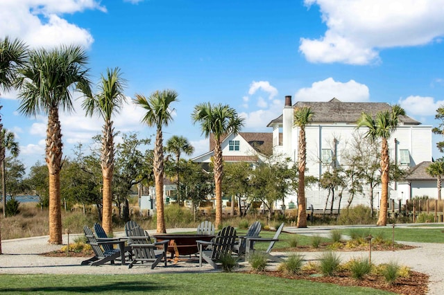 view of property's community with a patio