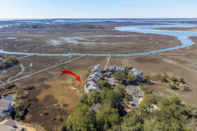 bird's eye view featuring a residential view and a water view