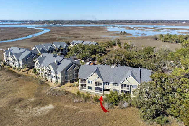 bird's eye view with a water view and a residential view