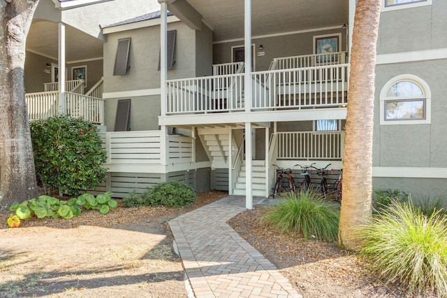 view of building exterior with stairs